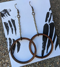 Load image into Gallery viewer, Hoops on chains in lasercut masonite
