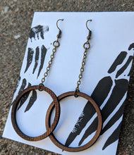 Load image into Gallery viewer, Hoops on chains in lasercut masonite
